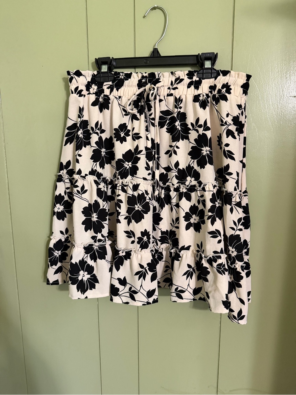 SHEIN Black Floral Print Tiered Mini Skirt on Cream